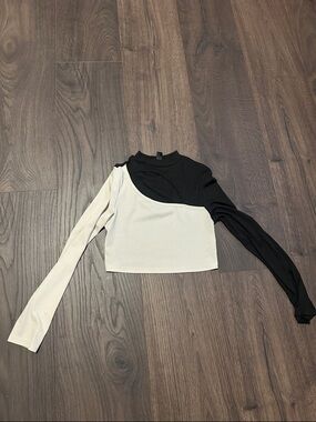 Asymmetrical Two-Tone Long Sleeve Crop Top - Black & Cream. Cut out on chest